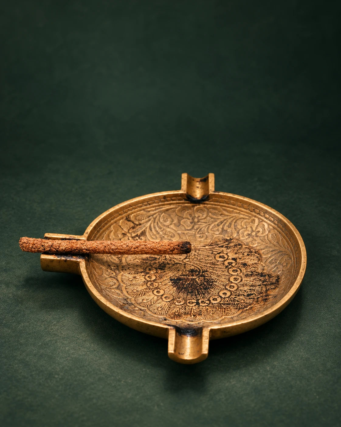 Dream Lion incense on an engraved brass holder